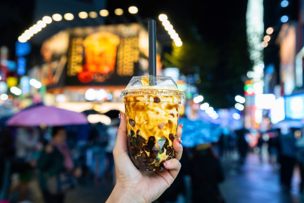 Bubble tea in a night market in Taiwan, one of the world's best destinations for street food - Luxury Escapes 