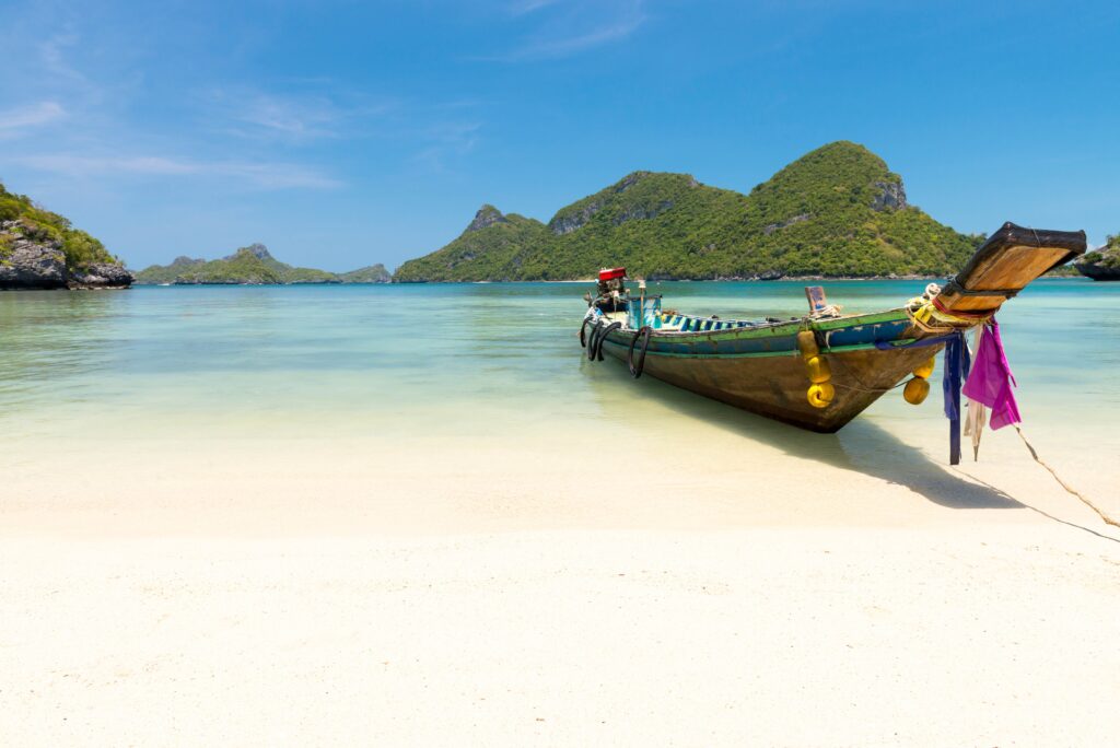 Koh Samui's traditional longboats and perfect beaches have become world-famous - Luxury Escapes
