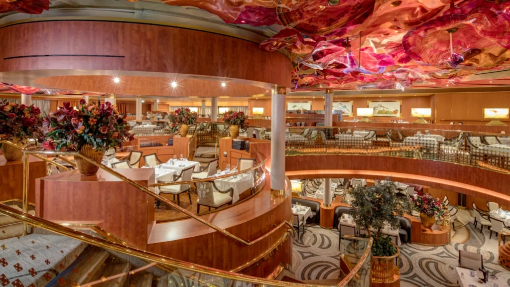 The glamorous dining hall of the Noordam ship of the Holland America Line - Luxury Escapes 
