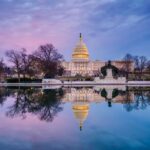 A view of the White House and the National Mall reflecting on the water's surface, one of the best spots to visit in Washington, DC - Luxury Escapes