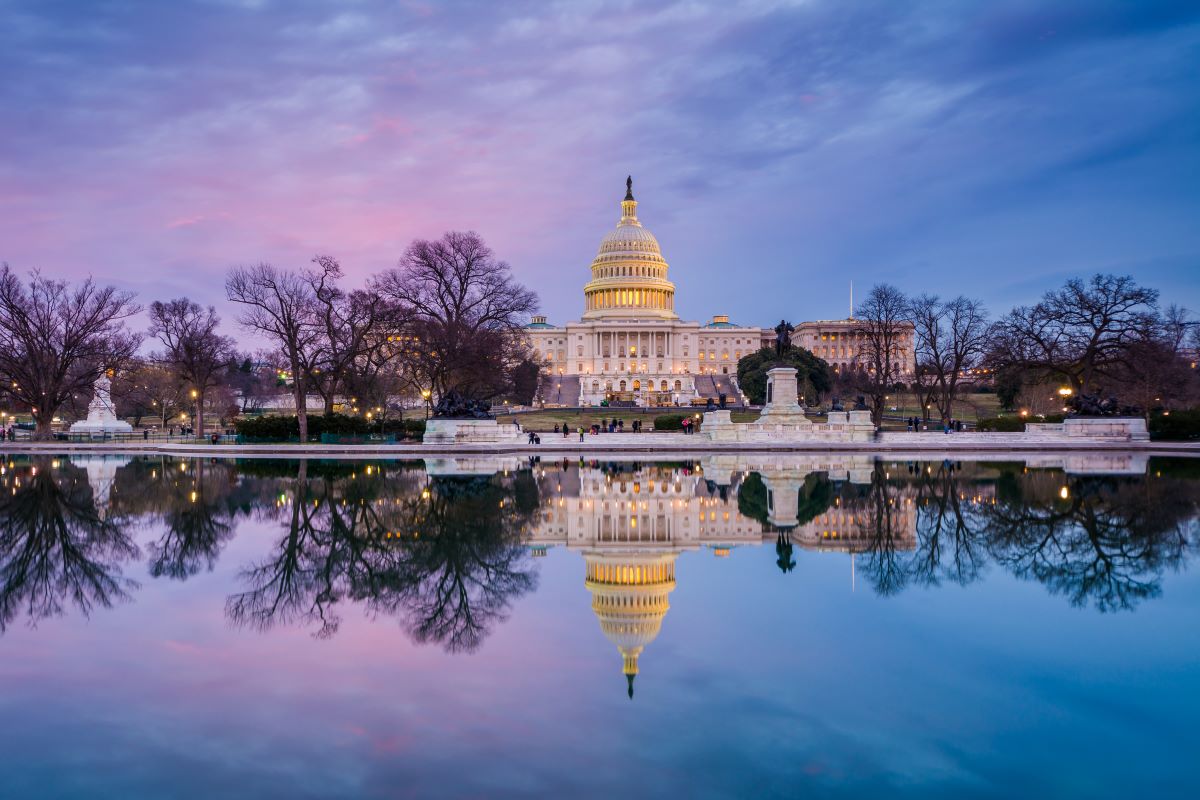 A view of the White House and the National Mall reflecting on the water's surface, one of the best spots to visit in Washington, DC - Luxury Escapes