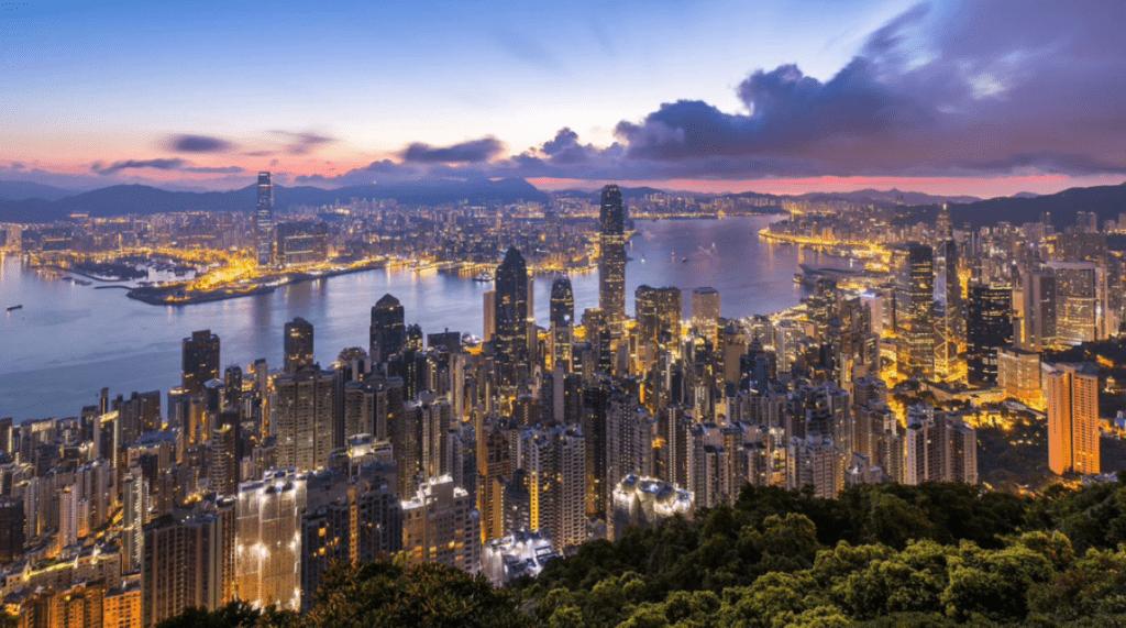 A view of Hong Kong at night - Luxury Escapes