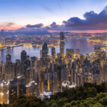 A view of Hong Kong at night - Luxury Escapes