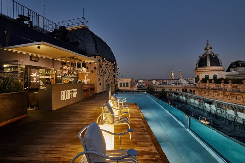 The rooftop pool and bar at Ohla Barcelona, one of the most luxurious stays in Spain - Luxury Escapes