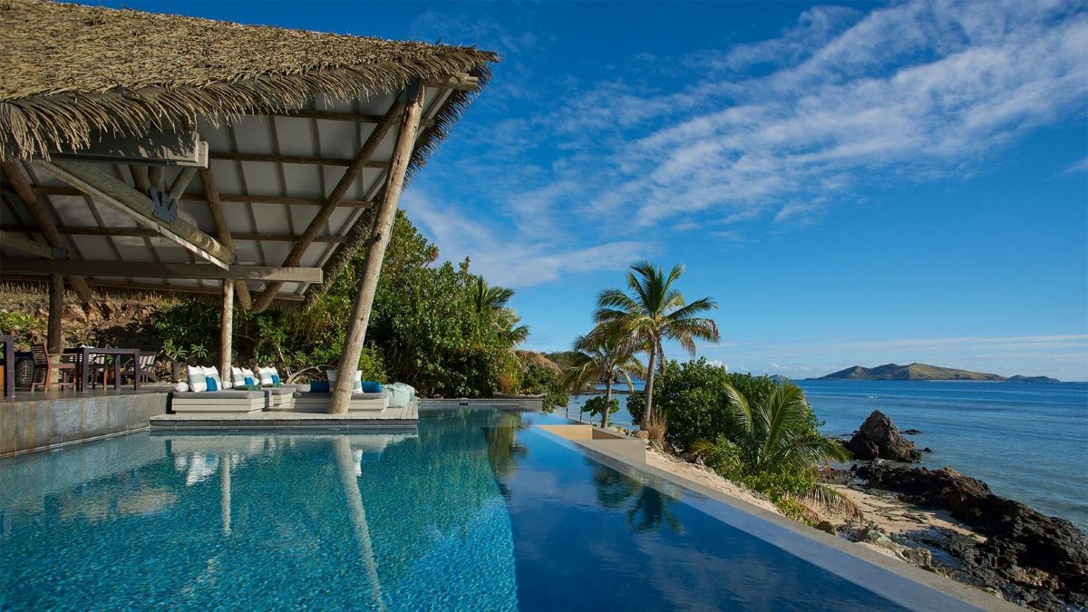 The pool at Tadrai Island Resort, one of the best adults-only hotels in Fiji - Luxury Escapes