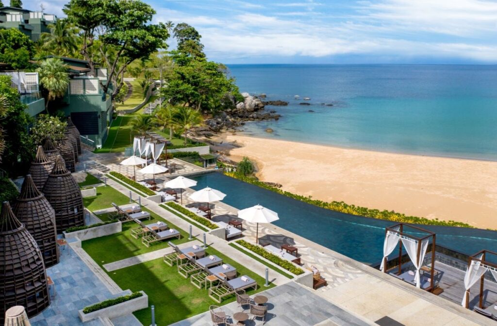 An aerial shot of the beachfront pool at The Shore at Katathani, one of the best resorts to stay at in Phuket - Luxury Escapes