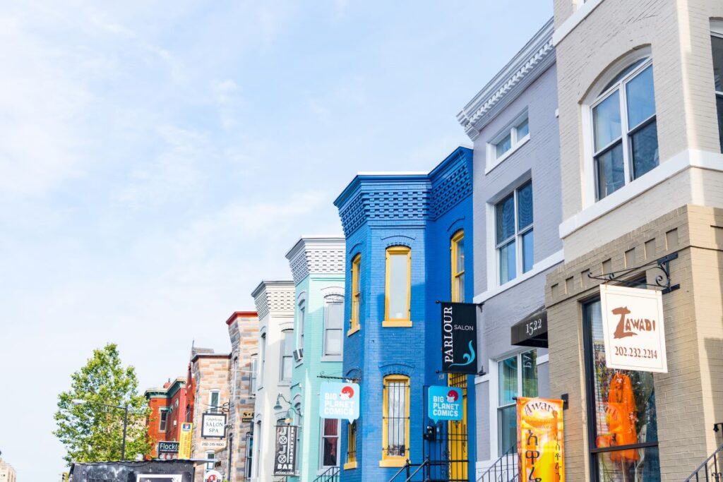 The colourful exteriors of a series of buildings in U Street, which is one of the best areas to visit while exploring Washington, DC - Luxury Escapes