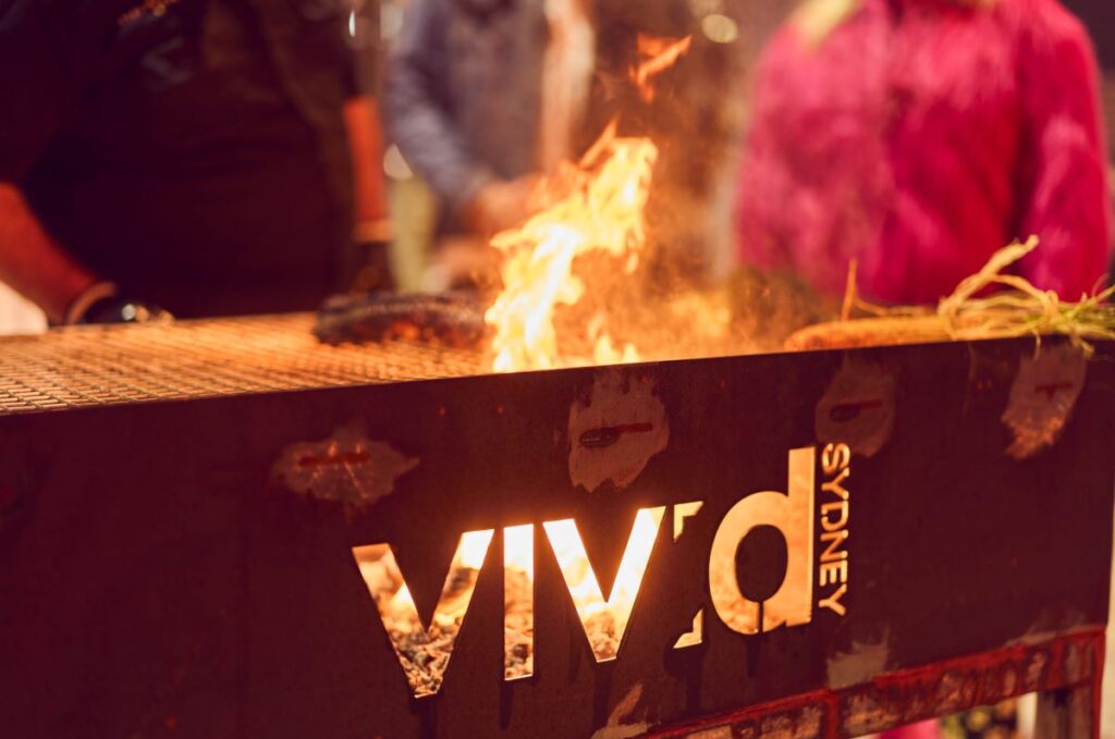 Image of a fiery barbecue at the Vivid Sydney Fire Kitchen event - Luxury Escapes 