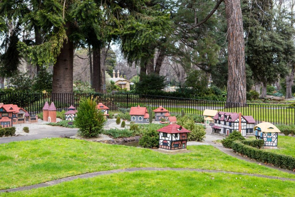 A scene of the small English Tudor village in Melbourne's Fitzroy Gardens - Luxury Escapes 