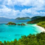 A aerial view of the picturesque Trunk Bay in the US Virgin Islands, which ranked first in the 2024 list of The World's 50 Best Beaches - Luxury Escapes