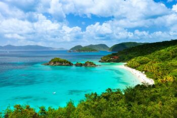 A aerial view of the picturesque Trunk Bay in the US Virgin Islands, which ranked first in the 2024 list of The World's 50 Best Beaches - Luxury Escapes