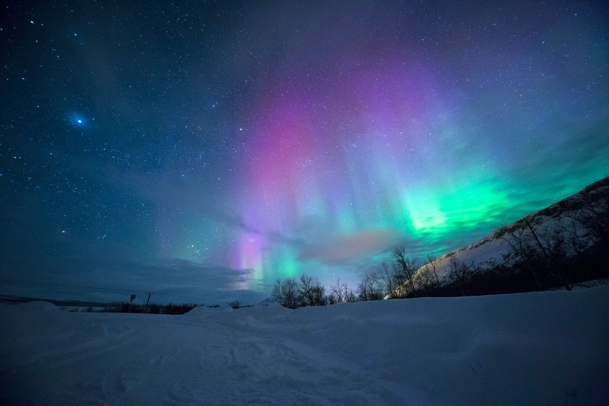The Aurora Borealis in Norway, one of the best places to see an aurora - Luxury Escapes