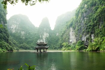 An image of Trang An, Ninh Binh, Vietnam to illustrate an article on Vietnam tours - Luxury Escapes