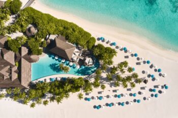 An aerial shot of Seaside Finolhu Baa Atoll, one of the Maldives most unique resorts - Luxury Escapes