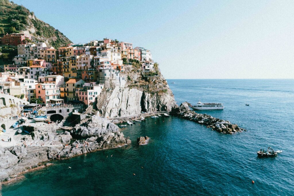 The cliffs of Manarola in the Cinque Terre, one of Europe's most popular summer destinations - Luxury Escapes