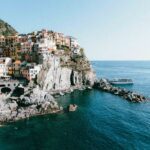 The cliffs of Manarola in the Cinque Terre, one of Europe's most popular summer destinations - Luxury Escapes