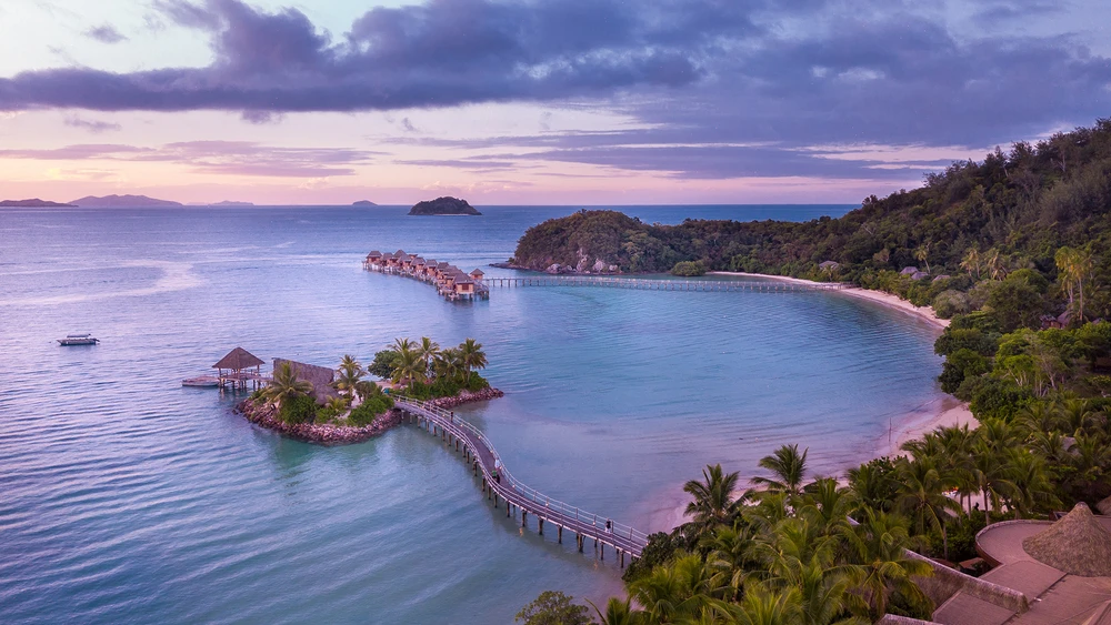 Serenity and warm sands await with a relaxing honeymoon at luxurious Likuliku Lagoon Resort on Malolo Island, Fiji - Luxury Escapes