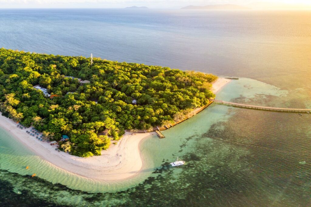 An aerial view of Green Island in Cairns, home to Green Island Resort - Luxury Escapes