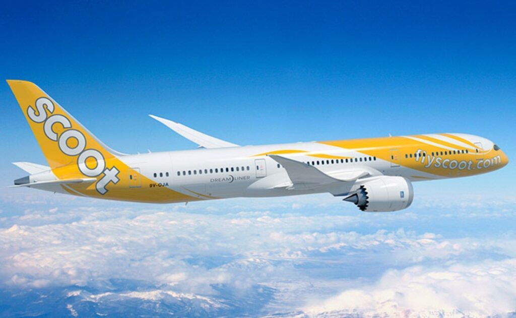 A Scoot plane in signature yellow and white - Luxury Escapes