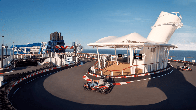 Norwegian Cruise Line's Norwegian Encore has a go-kart track, perfect if you're cruising with kids - Luxury Escapes