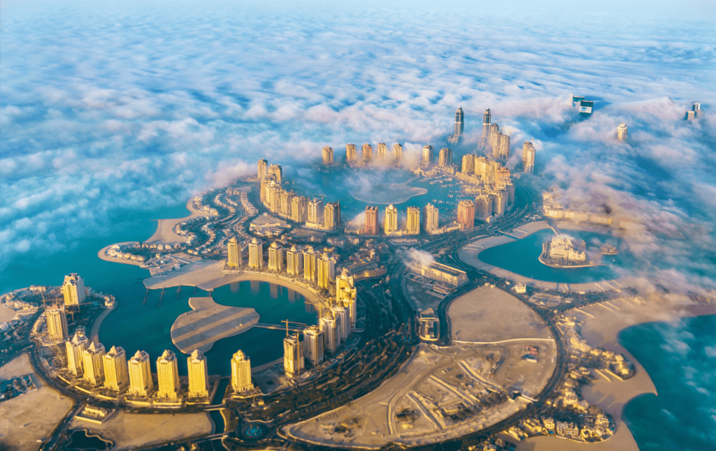 Aerial view of the Pearl-Qatar island in Doha, Qatar, to illustrate an article of what to expect from your first visit to Qatar - Luxury Escapes