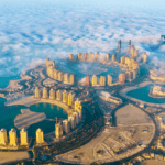 Aerial view of the Pearl-Qatar island in Doha, Qatar, to illustrate an article of what to expect from your first visit to Qatar - Luxury Escapes