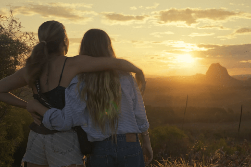 The sunset at the Glasshouse Mountains, a luxury escapes destination to add to your Gold Coast Hinterlands road trip in the Land Rover Discovery