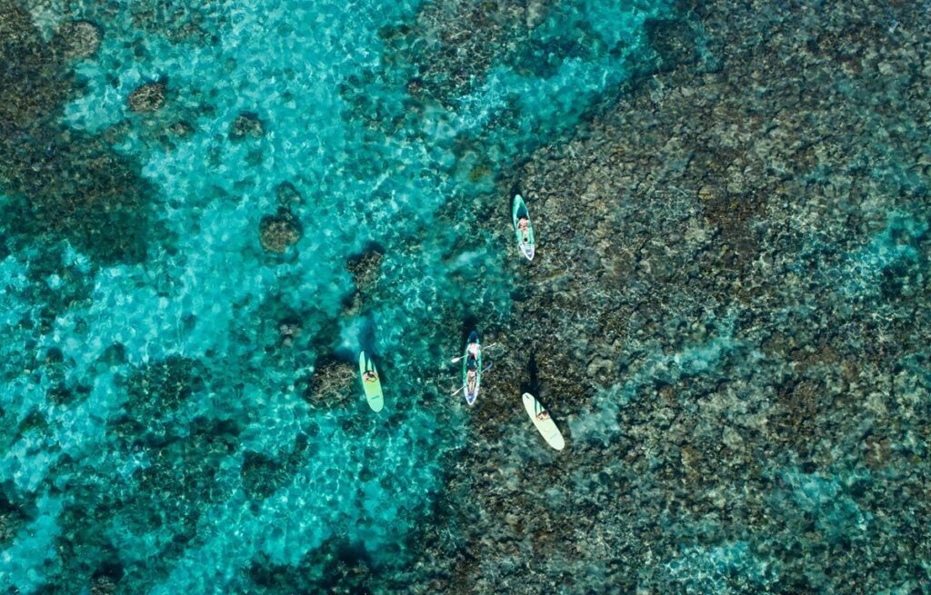 An aerial view of Ningaloo Reef, right beside Sal Salis Ningaloo Reef - Luxury Escapes