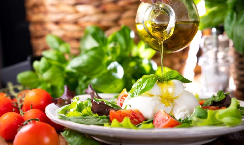 Olive oil, tomatos and burrata, a delicious Puglia feast - Luxury Escapes