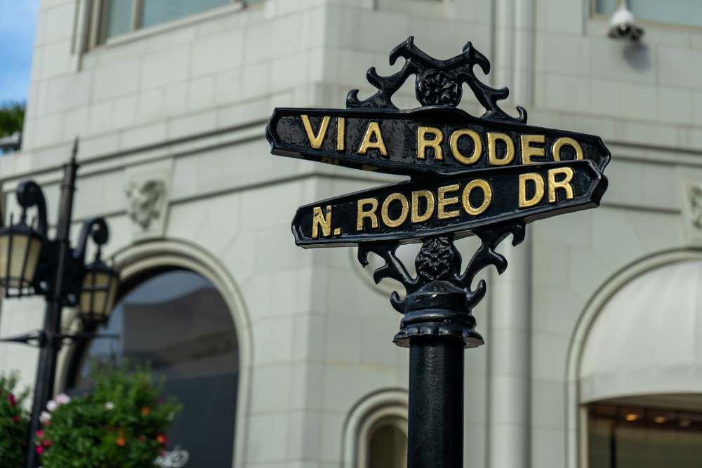 Street signs showing Los Angeles Rodeo Drive - Dream by Luxury Escapes