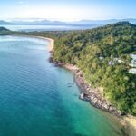 Aerial shot over Elandra, Mission Beach - Luxury Escapes