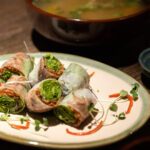 Spring rolls in a beautiful restaurant setting - Luxury Escapes