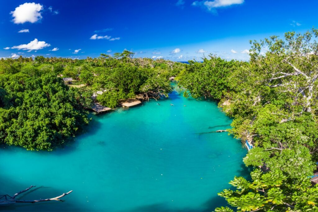 Swing like Tarzan from ropes and vines into the naturally occurring swimming pools known as the Blue Holes - Luxury Escapes