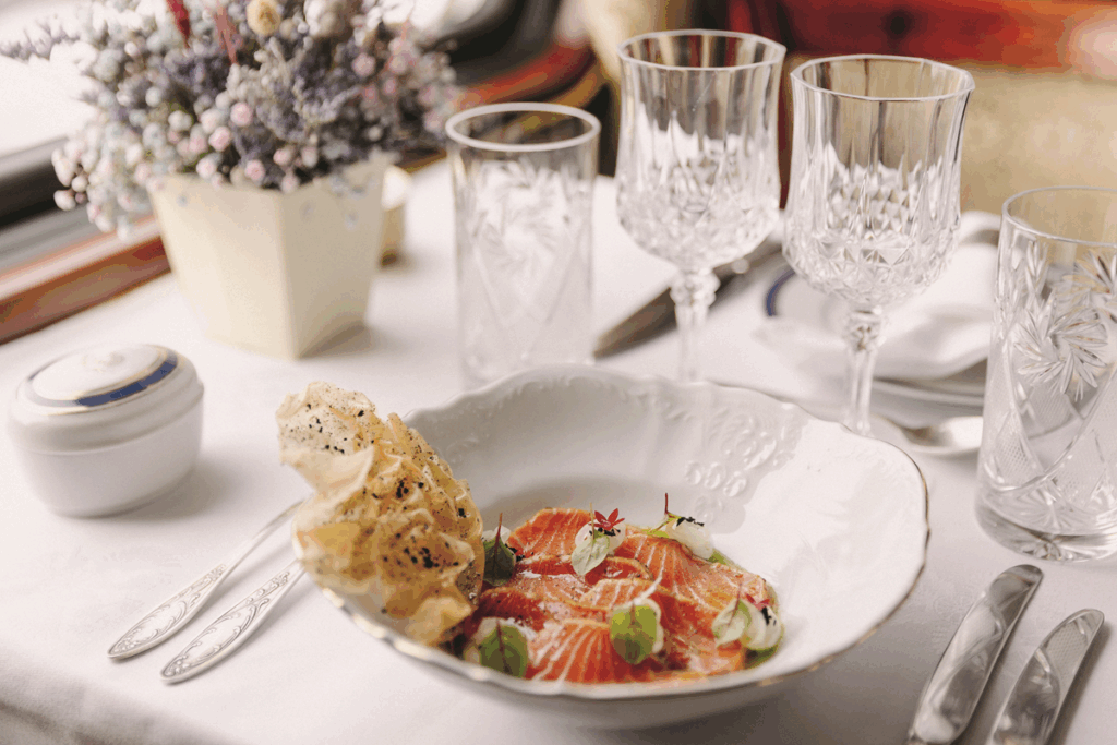 A meal on the Golden Eagle luxury private train journey through Central Asia - Dream by Luxury Escapes