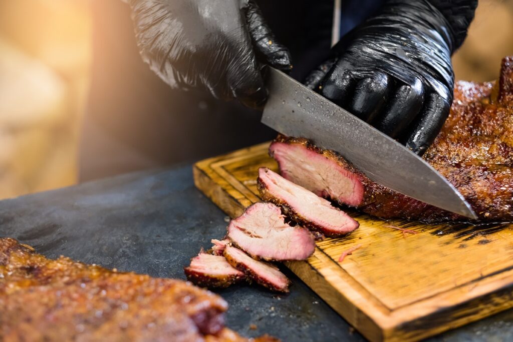 A piece of brisket from Texas, one of America's most iconic foods - Luxury Escapes