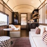 The lounge space in the new Aurora Australis suites on The Ghan - Luxury Escapes