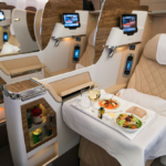 Dining in Emirates business class - Luxury Escapes