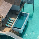 The over water villa at Rah Gili Maldives, one of the resorts featured in Luxury Escapes' direct charter flight