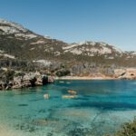 Kayaking in Fotheringate Bay, Flinders Island, one of the best things to do in Tasmania - Luxury Escapes