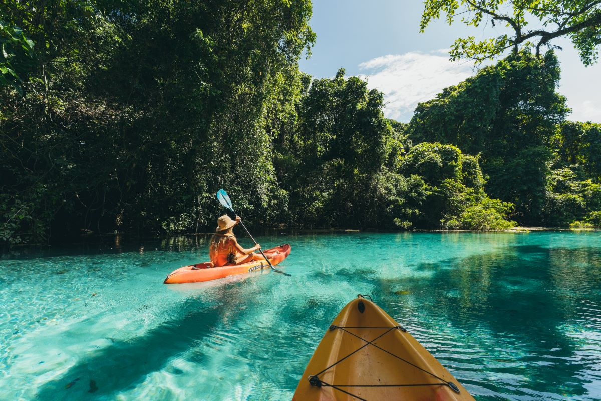 Kayaking in Espiritu Santo, one of the reasons to go to Vanuatu - Luxury Escapes