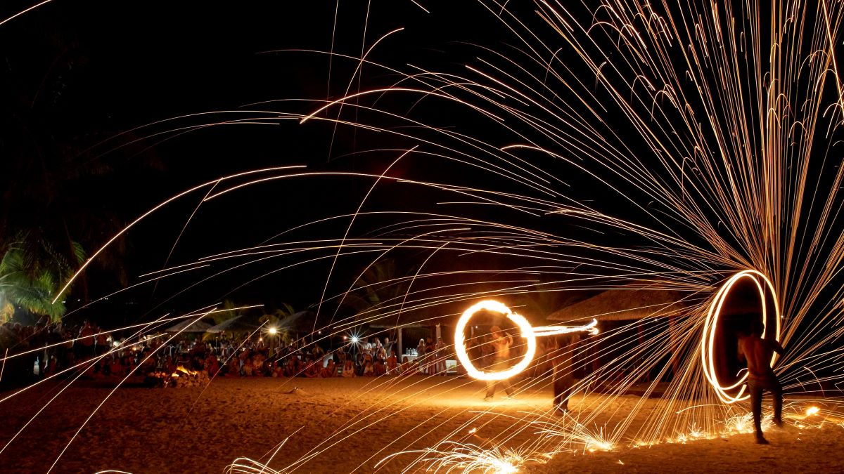 Fire show in Efate, one of the best things to do in Vanuatu - Luxury Escapes