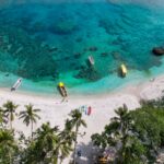 Lelepa Island boats, one of the reasons to go to Vanuatu - Luxury Escapes