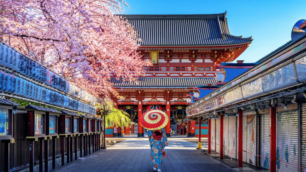 Asian woman wearing japanese traditional kimono at Temple in Tokyo, Japan.