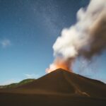 Mount Yasur, a volcano in Vanuatu. The landscapes are a reasons to go to Vanuatu - Luxury Escapes