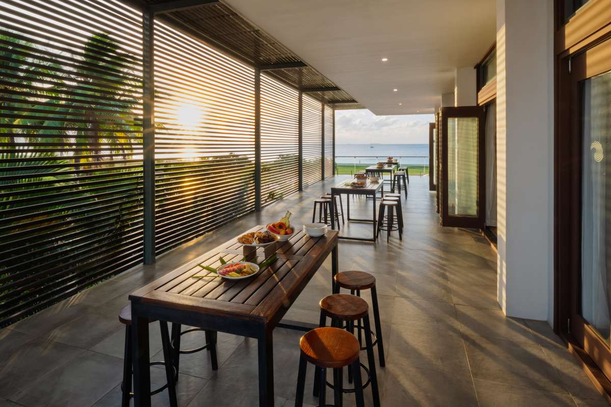 Outdoor terrace and balcony at Hilton Fiji Beach Resort & Spa, Denarau Island - Luxury Escapes