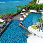 Infinity pool overlooking the Indian Ocean in Nusa Dua at Samabe Bali Suites & Villas. Luxury Escapes.