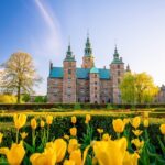 Rosenborg Castle surrounded by tulips in Copenhagen, Denmark