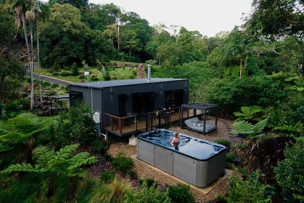Forest cottage and outdoor hot tub at Misty View Cottages