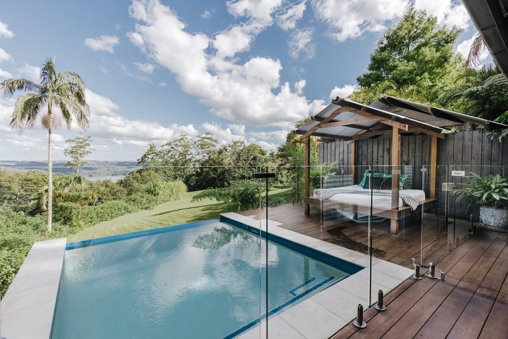 Private pool and forest outlook at Misty View Cottages