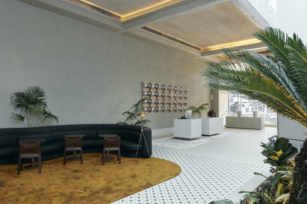 Moderne Empfangslounge mit gebogenem Sofa im Novotel St Kilda